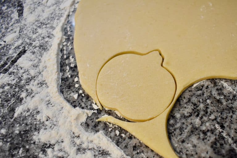 cutting cookies from dough