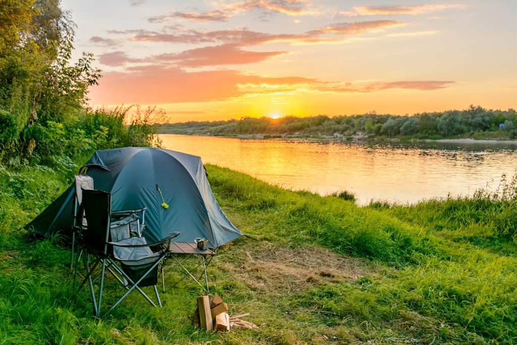 Camping tent in a camping in a forest by the river